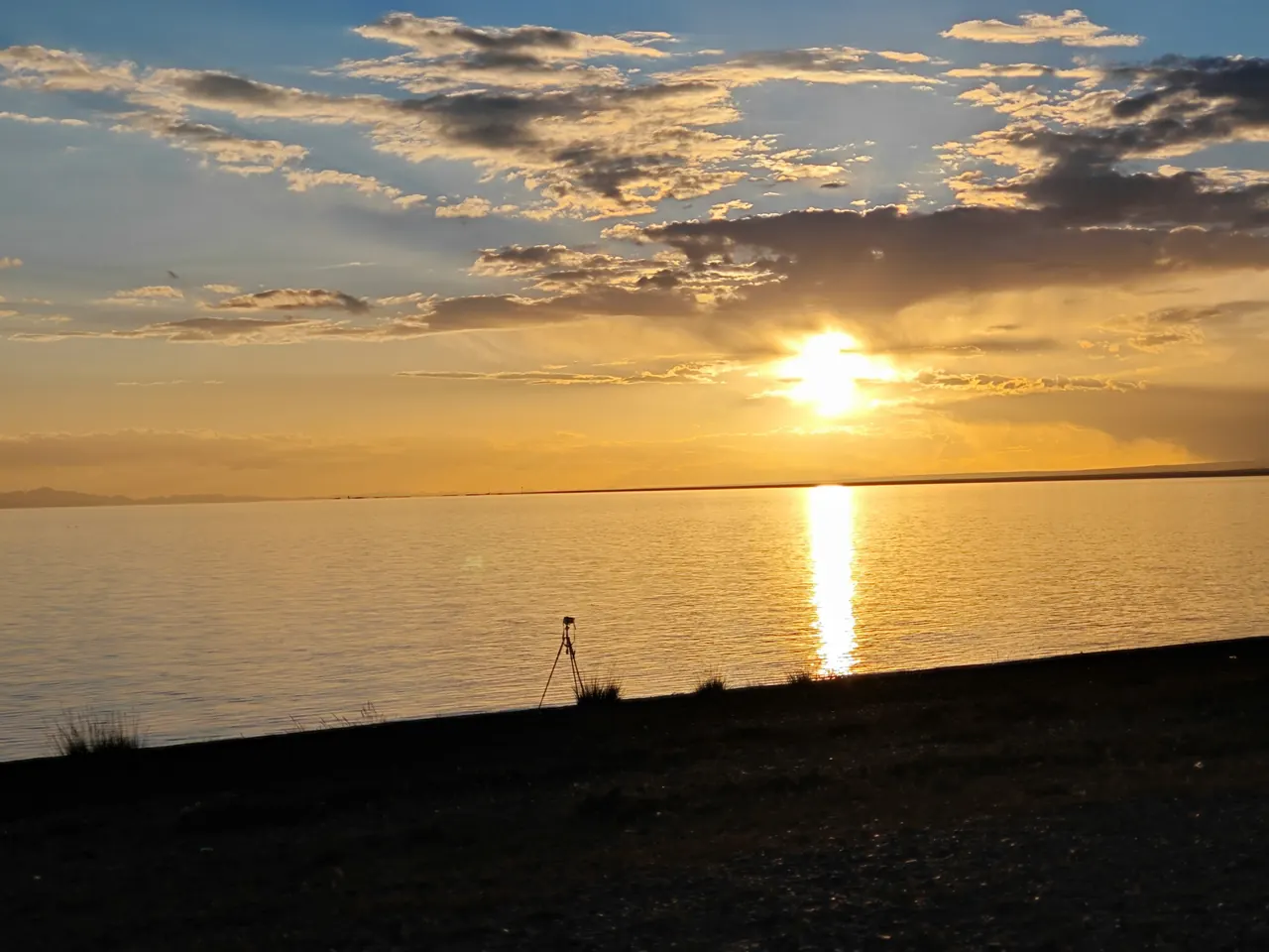 Sunset over Qinghai Lake. Destination setting; specific visits and arrangements depend on the selected programme.
