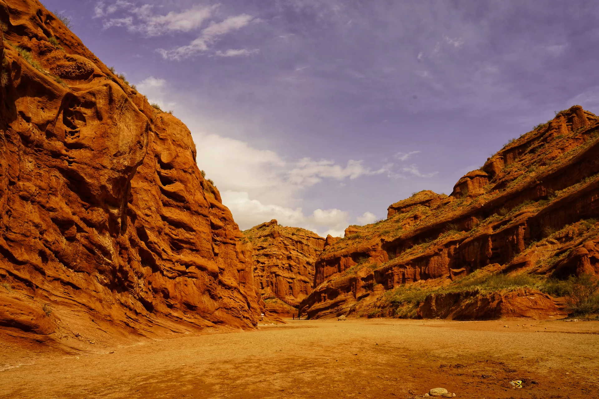 Wensu Grand Canyon, Aksu — layered rock formations and canyon floor.